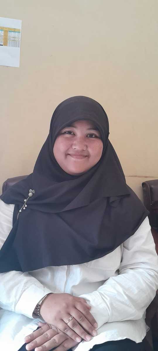 Dewi Tri Febriyanti, S.Pus